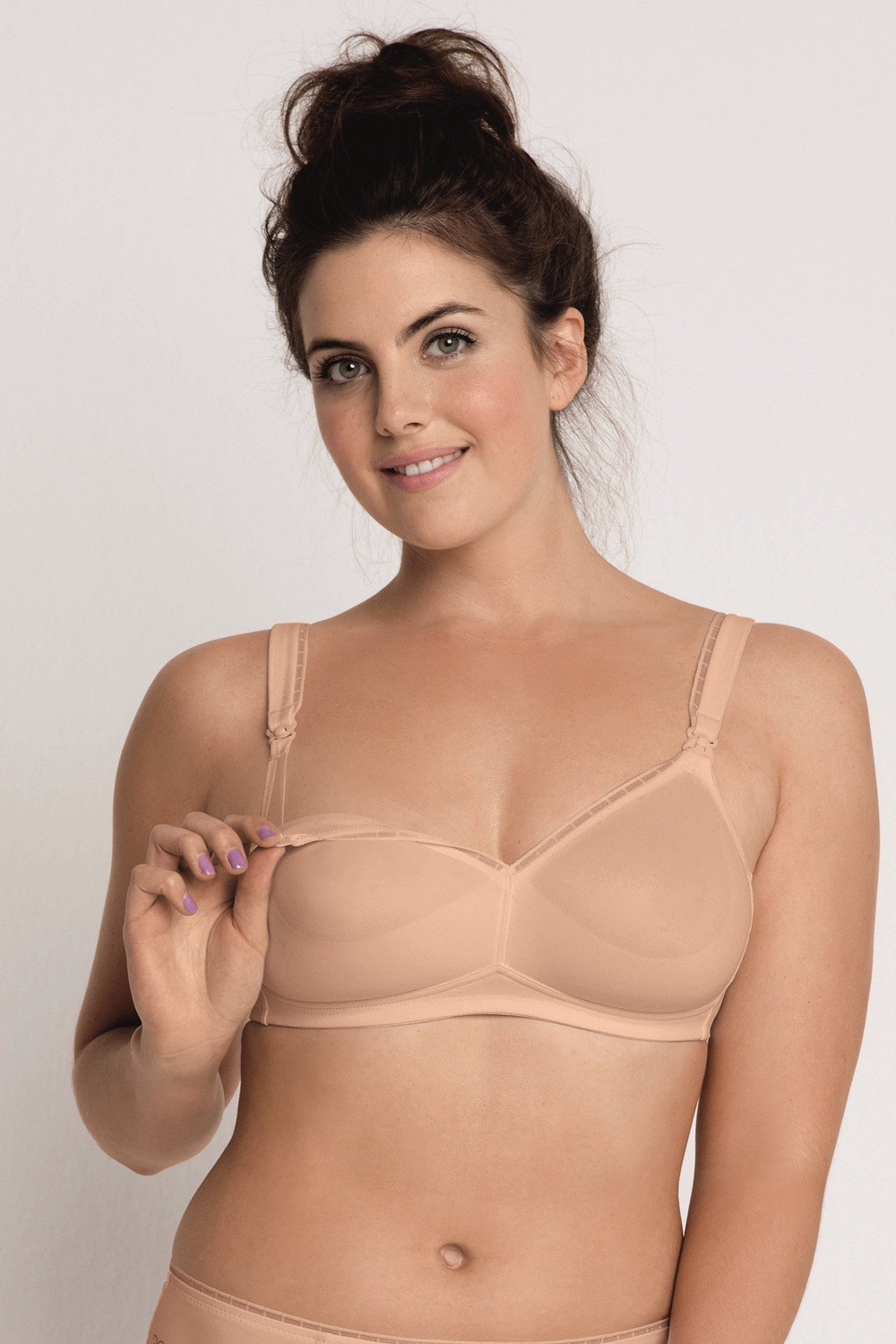 Nonwired nursing bra made of fine microfiber. Soft cups without