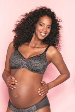 Soft underwired pregnancy bra with seamless cups made of fine microfiber. In modern design.