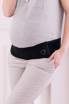 Stylish pregnancy belt with Velcro system. Relieves pain and supports properly.
